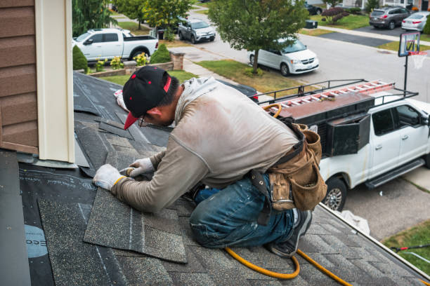 Professional Roof Replacement technician working in Saint Clair, PA